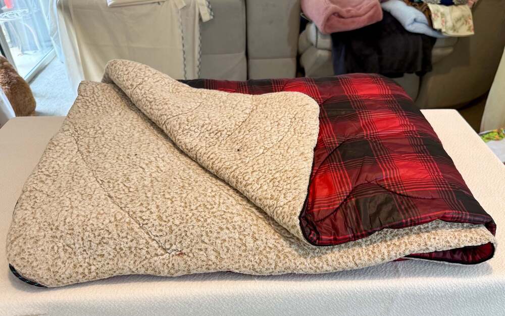 Rumpl Puffy Sherpa Fleece Reversible Travel Blanket in Red and Black